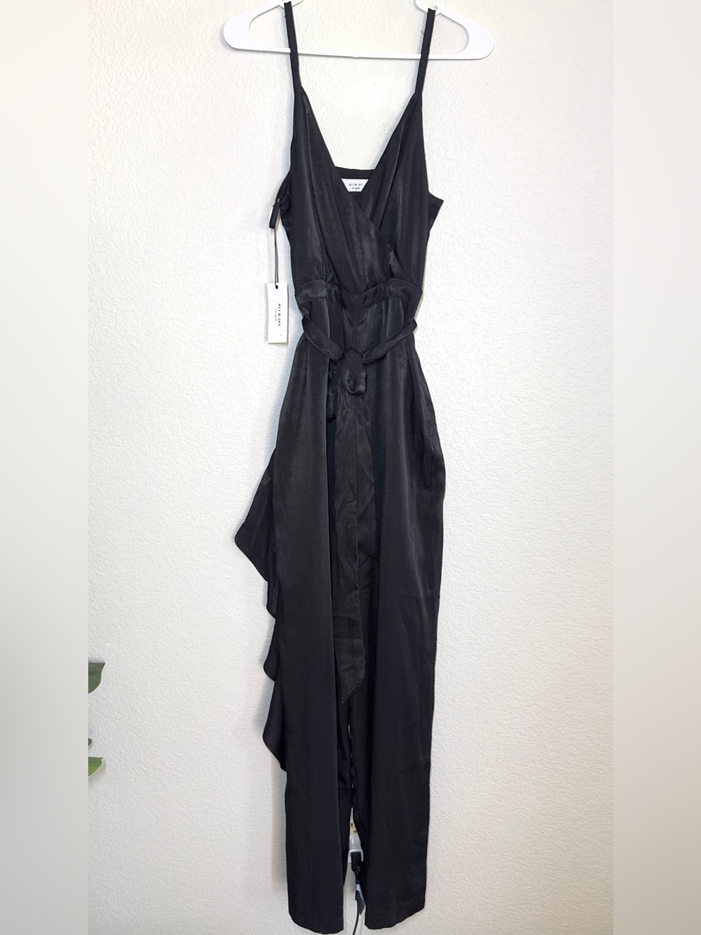 Ali & Jay Name of Love Ruffle Black Wrap jumpsuit.